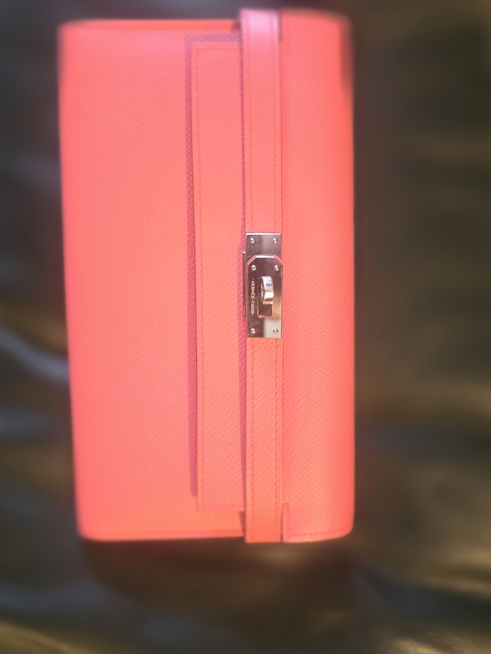 Hermes coral leather clutch with silver hardware